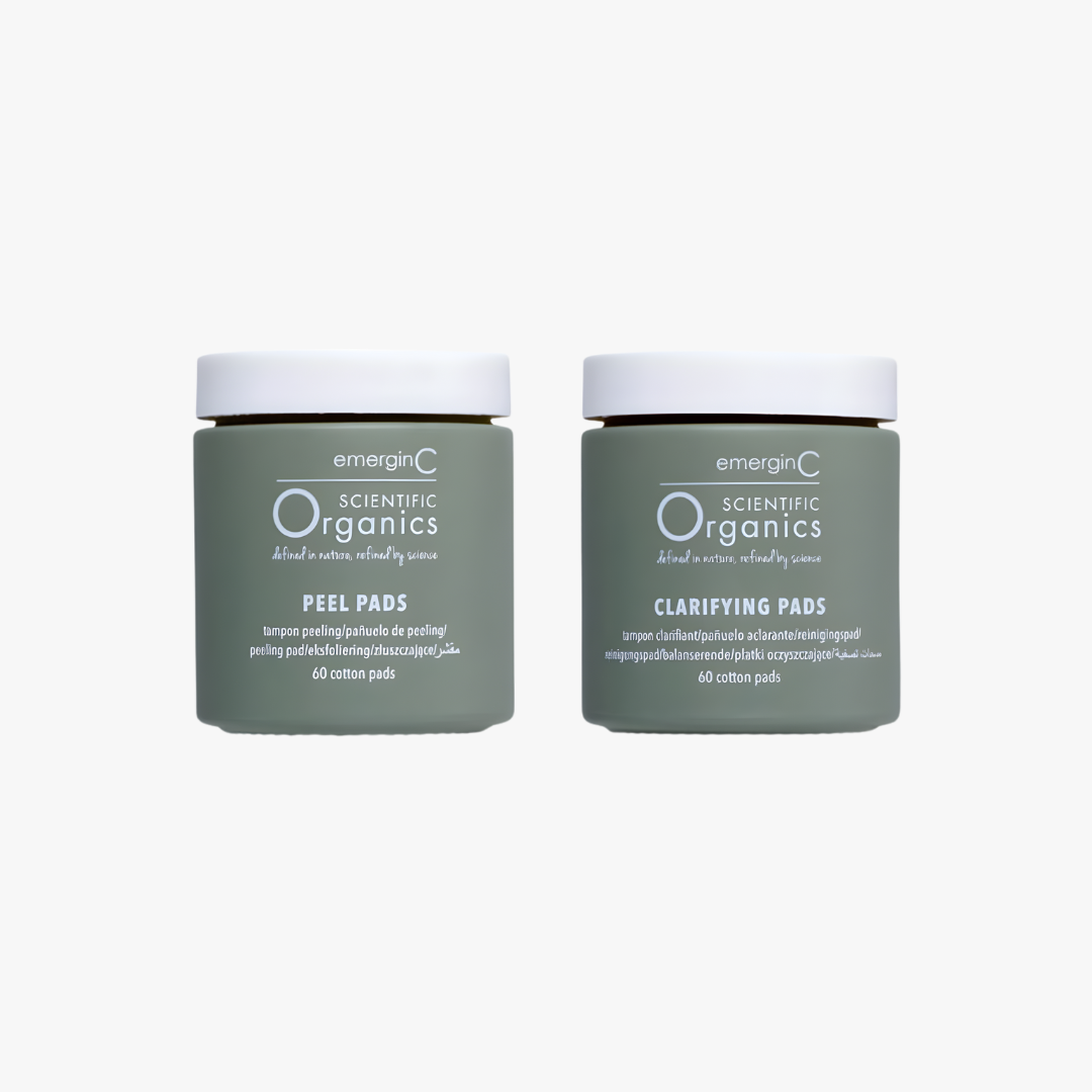 Two jars of emerginC Scientific Organics peel pads and clarifying pads on a white background